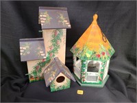 2 decorated bird houses