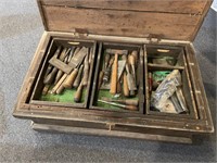 Antique toolbox full of tools