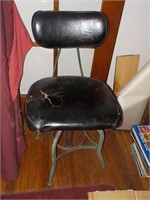 Antique iron base swivel chair