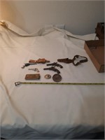 Vintage miniature guns and buckles