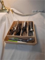 Tray of flatware and utensils