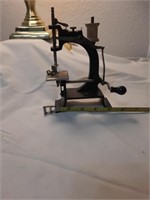 Fraley Williams  baby cast toy sewing machine