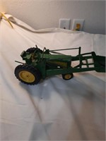 Vintage JD620 tractor with JD loader