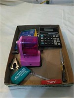 Calculator, pencil sharpener miscellaneous
