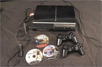 PlayStation 3 w/ 2 Controllers & 3 Games