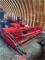 MF 775 swather, open station
