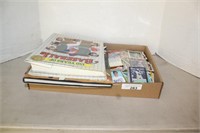 BOX OF VARIOUS BASEBALL CARDS AND BOOKS