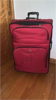 Suit case on wheels 32 inches x 20 inches x 14