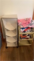 Two shelf units with miscellaneous clothes