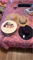 Three hats and hat box