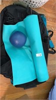 Two large duffel bags, exercise ball and yoga mat