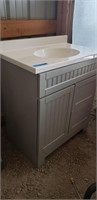 Gray vanity with top 35" T 31" W 19" D