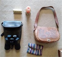 Hand crafted leather purse, Bushnell binoculars