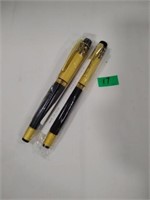 2 NIP roller ball goldtone pens