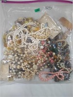 Unsorted costume jewelry 1.6lbs