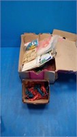 Box of old road maps and toys