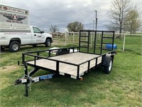 653. 2015 TopHat 6.5’x12’ Bumper Pull Trailer