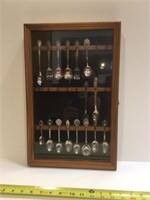 Collector spoons in a really nice display cabinet