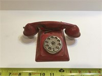 Vintage red tin dial toy telephone