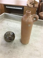 Handmade jug and heavy marbled ball