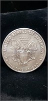 1oz. Pure Silver.  American Eagle Silver Dollar.