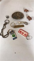Lot of keychains and Nebraska State Patrol belt