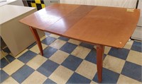 Retro dining room table with various chairs