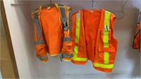 Two reflective safety vests, one mesh style. Both