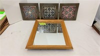 Small wall hanging mirror and a metal home decor