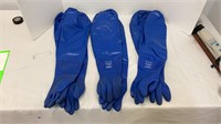 Three pairs of long blue rubber gloves