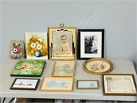 assorted framed pictures