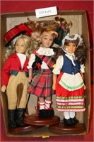 3 PLASTIC DOLLS WITH STANDS