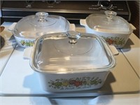 3 Corning Ware baking dishes with lids