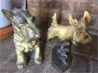 3 dog figurines