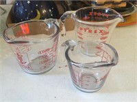 1 Pyrex and 2 Anchor glass measuring cups