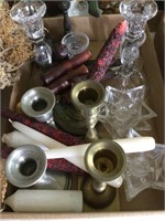 Lot of decorative candles and holders
