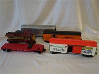 LOT OF FIVE TRAIN CARS