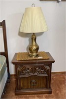 Bedside table and brass lamp