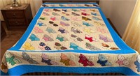 Hand-stitched butterfly quilt