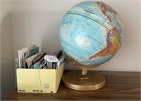 Vintage globe and road maps