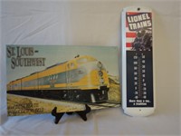 TIN SIGN  AND TIN LIONEL WALL THERMOMETER
