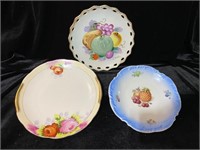 THREE HAND PAINTED ANTIQUE PLATES