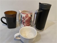Coffee mugs in containers
