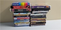Assorted DVDs and VHS Tapes