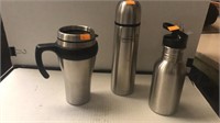 3 travel drink holders / mugs.