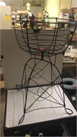 Wrought iron stand.  27.5in tall x 16 in diameter