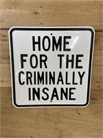 Porcelain embossed "Criminally Insane" sign