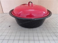 Black enamel pot with red lid