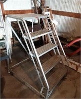 Set of aluminum stairs on wheels.