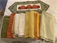 Nine table clothes and 1 table runner